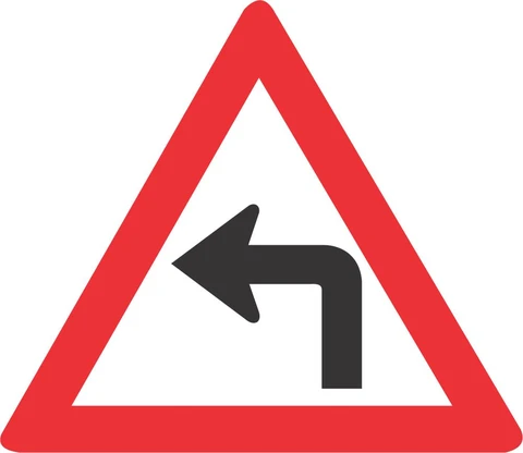 SABS Sharp Curve (Left) road sign