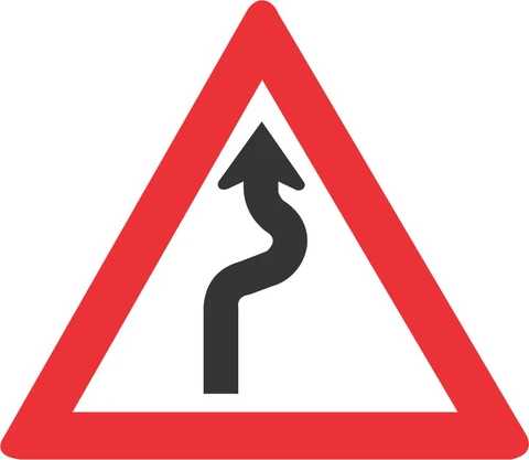 SABS Winding Road (Right - Left) road sign